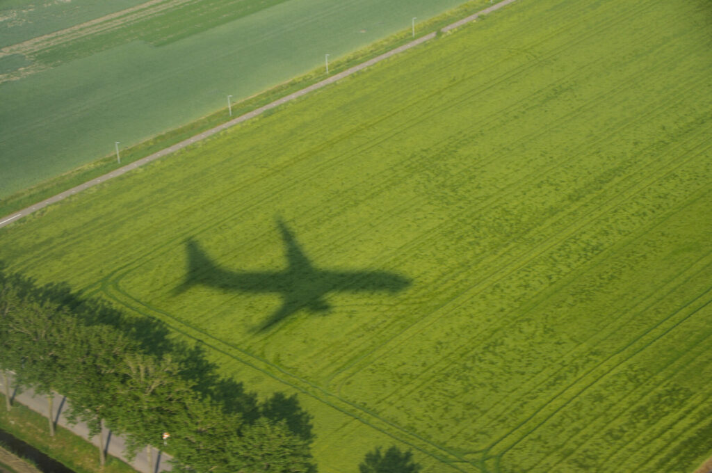Greenwashing Reise Flugzeug